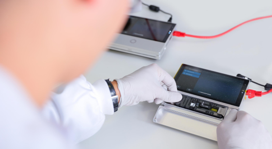 Nanopore lab minion mk1c with hands scientist and flow cell inserting