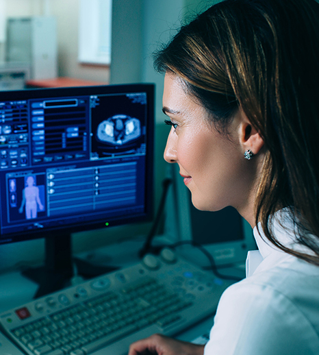 image of woman looking at screen for IP Group insight article about the Australian Accord