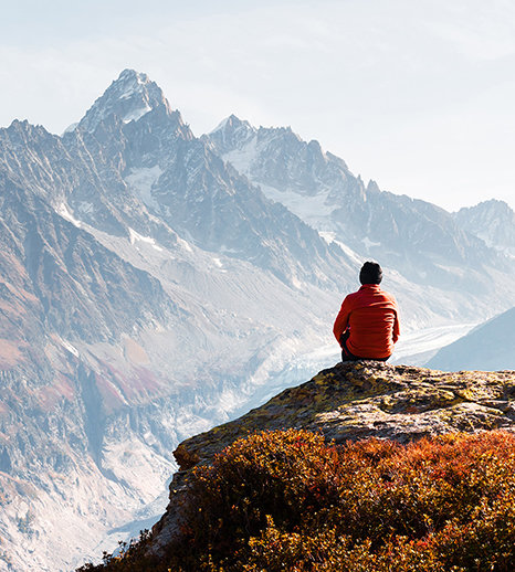 image of man gazing at mountain landscape for IP Group insight article about the Australian R&D Review’s link to Future Made in Australia 